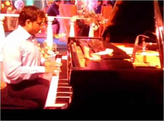 male piano player karnataka